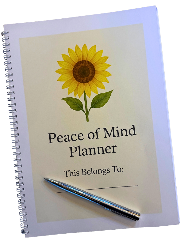 The cover of Jayne's Peace of Mind Planner showing a ring-bound planner with a sunflower on the cover.